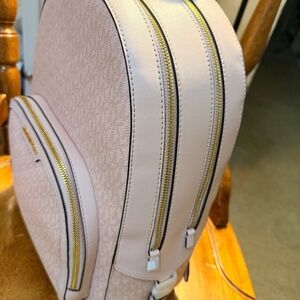 Michael Kors Backpack inside has lots of pockets